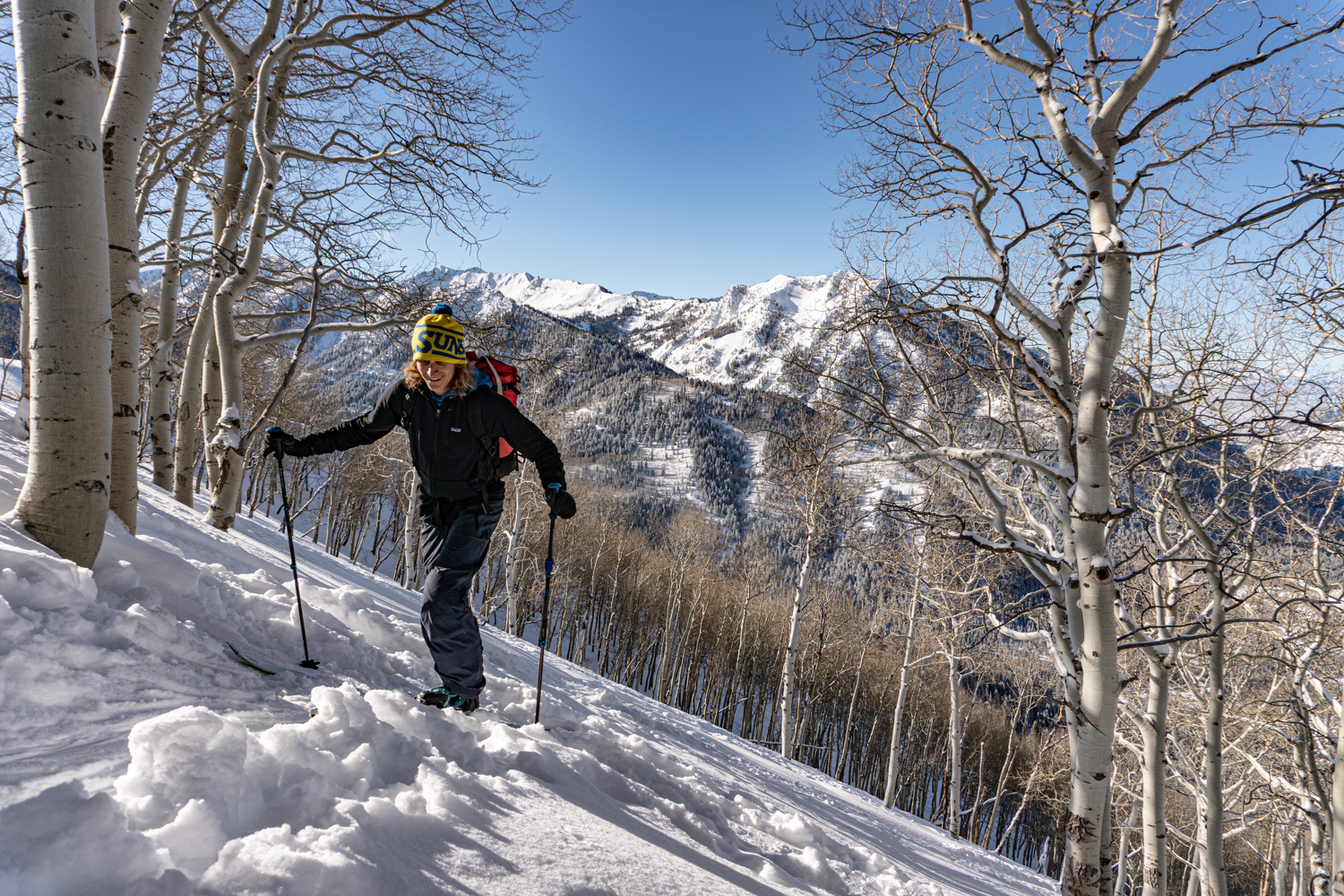 man skinning uphill short swing big cottonwood canyon wasatch mountains utah ski