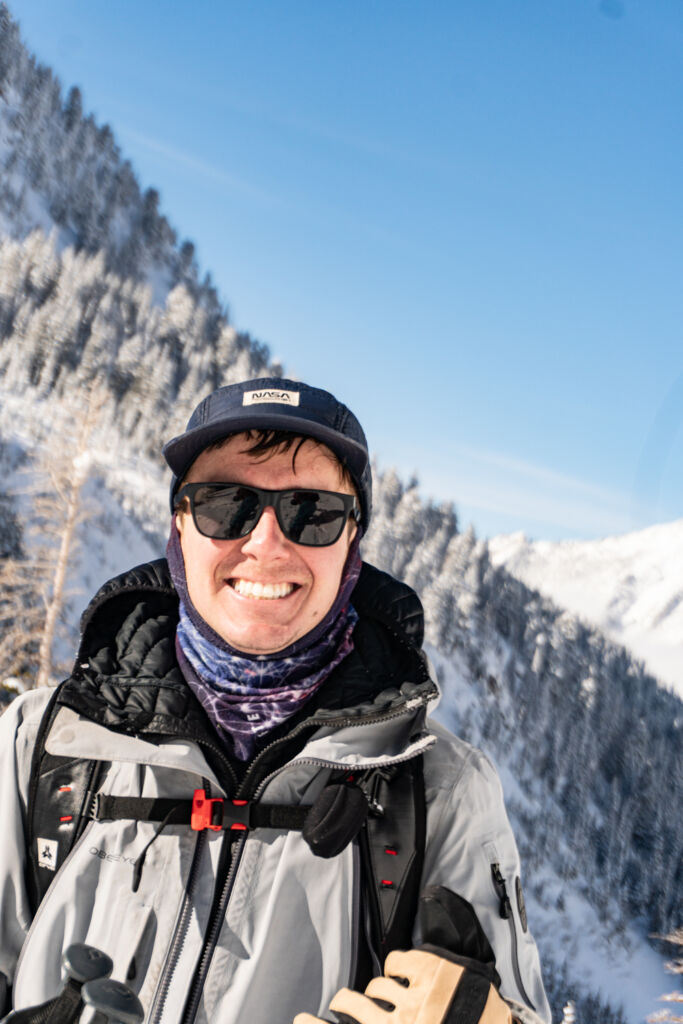 male backcountry skier excited in wasatch mountains Utah